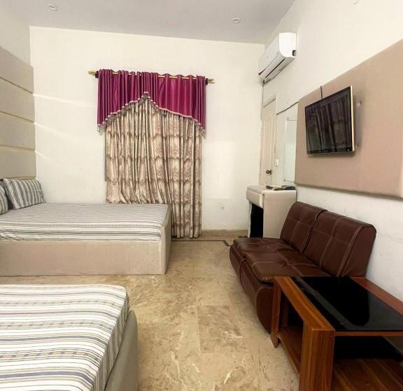 Economy Triple Room, The Value Guest House Near Airport