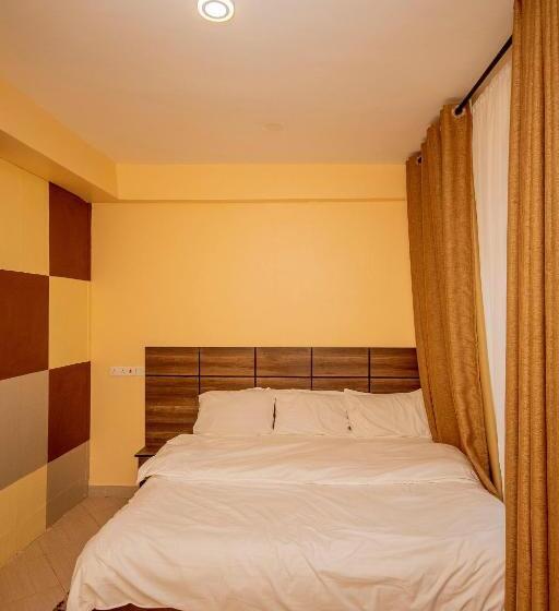 キングサイズベッドのデラックスルーム, Riverpoint Inn, Arusha