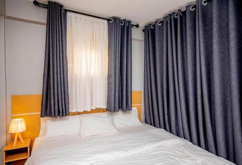 キングサイズベッドのデラックスルーム, Riverpoint Inn, Arusha