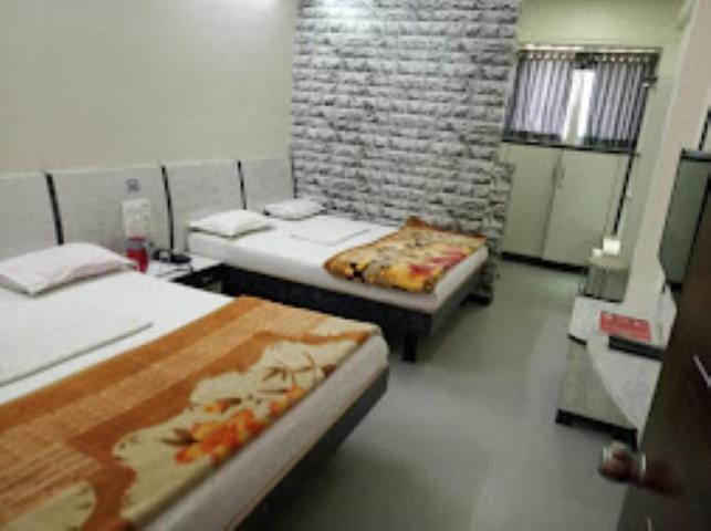 Quarto Quádruplo Standard, Vishal Palace,nashik