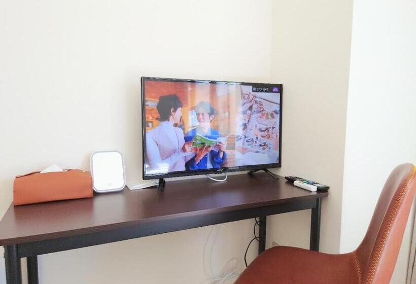 Quarto Triplo Standart, Sendagi Guest House