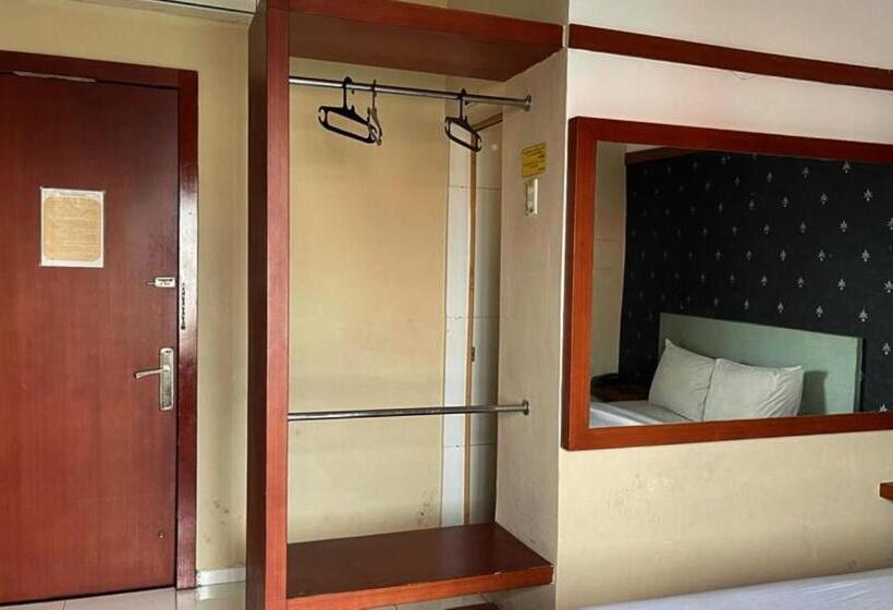 デラックスルーム, Capital O 93285 Residence Hotel Syariah