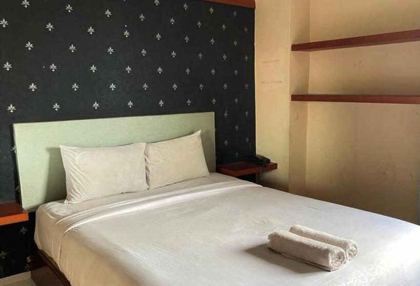 デラックスルーム, Capital O 93285 Residence Hotel Syariah