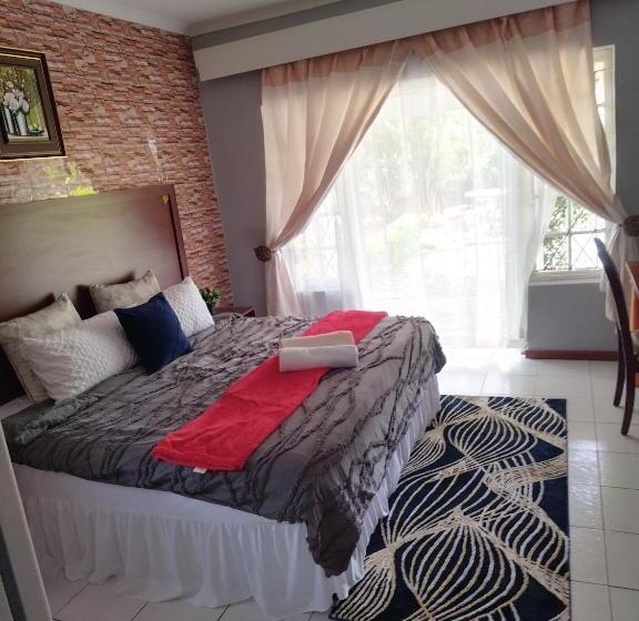 Стандартный Номер Кровать Кинг, Comrades Oasis Guest House