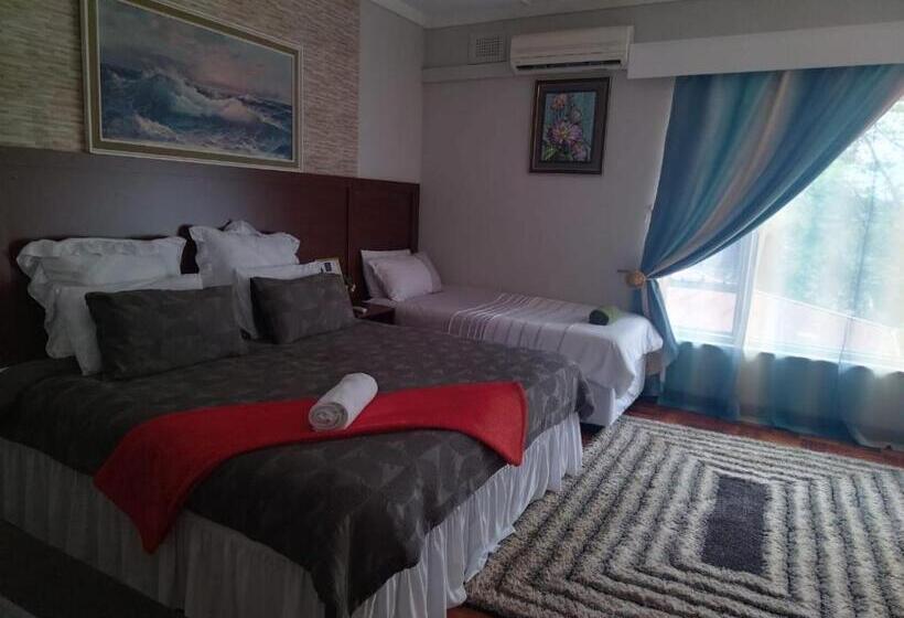 キングサイズベッドのスタンダードルーム, Comrades Oasis Guest House