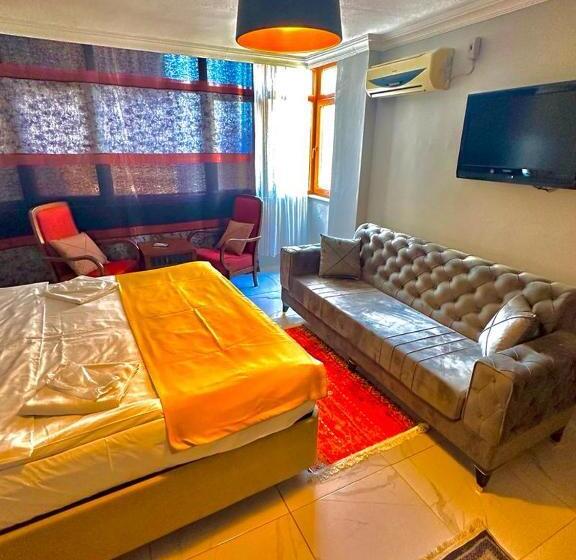 Quarto Triplo Deluxe, Raydon