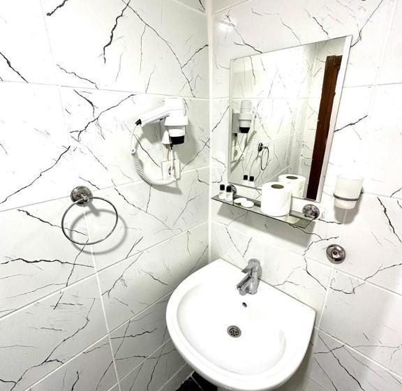 Quarto Triplo Deluxe Vista Mar, Raydon