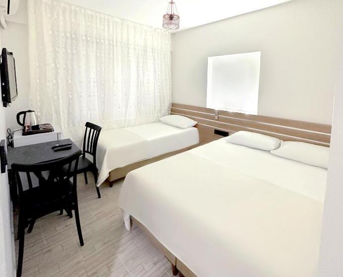 חדר סטנדרט לשלושה, Menesa