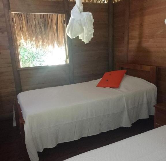 Habitación Triple Estándar Vista Jardín, Cabaña Wiwa Tayrona