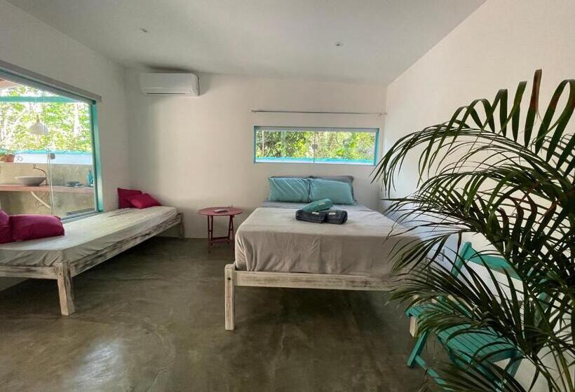 Quarto Triplo Deluxe, Oxóssi Suites