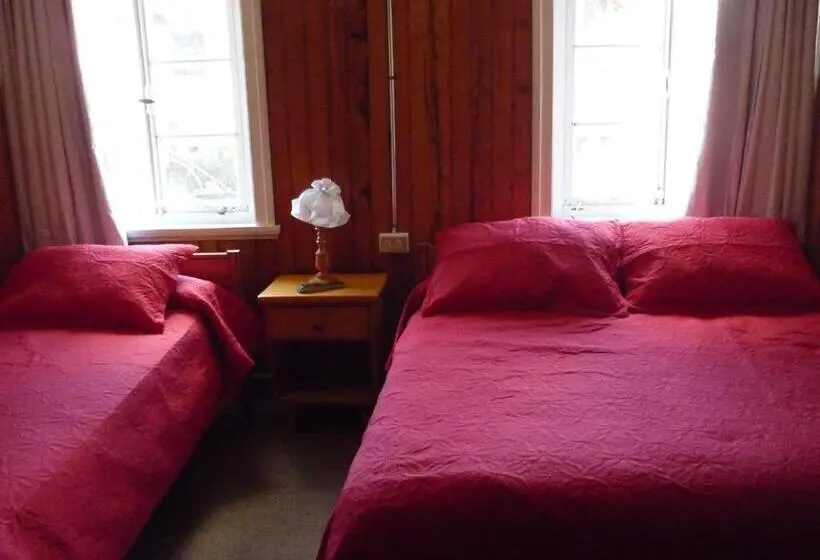 اتاق استاندارد سه تخته با سرویس بهداشتی مشترک, Hostal Y Cabañas Villa Germana
