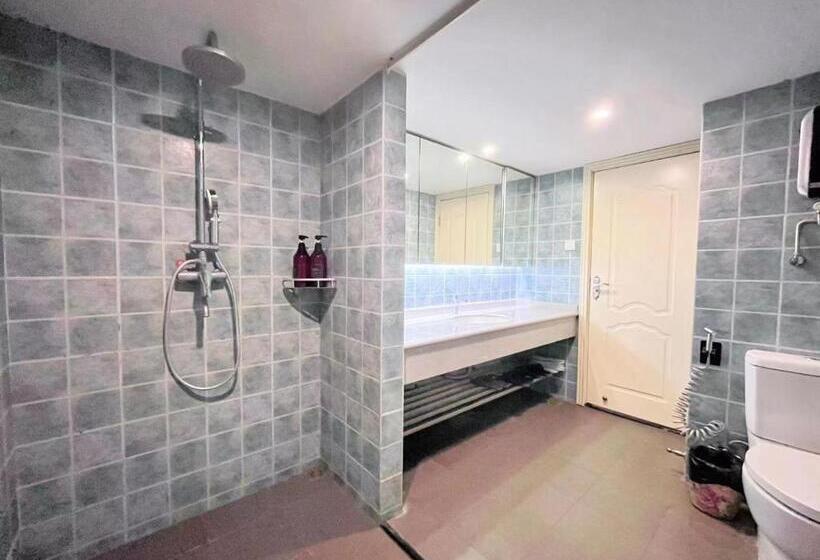 Quarto Triplo Estandar com Sacada, 广州沃家国际公寓