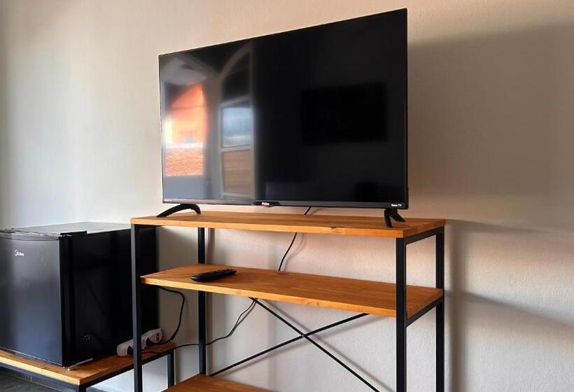 Номер Стандарт с Балконом, Suítes Aqui é Seu Lugar Itaguá