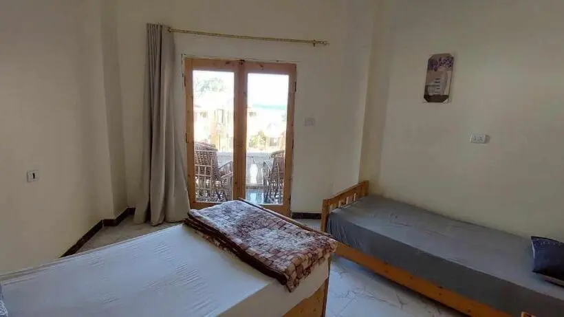 اتاق استاندارد سه تخته با چشمانداز استخر, Green Beach Camp &