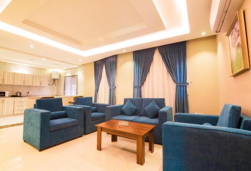 デラックスジュニアスイート, أجنحة بالم تري للشقق المخدومه