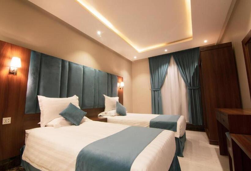 デラックスジュニアスイート, أجنحة بالم تري للشقق المخدومه