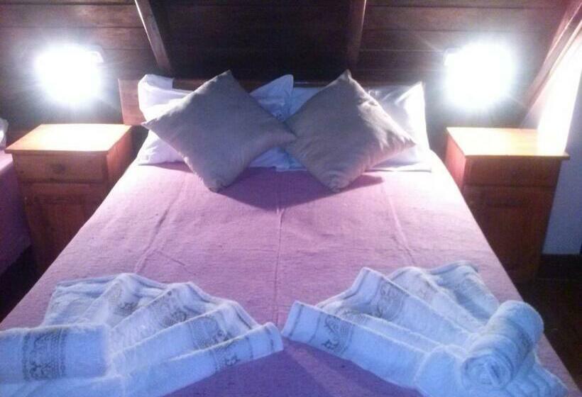 חדר משפחתי נוף לגינה, Petit Hotel Caraguata