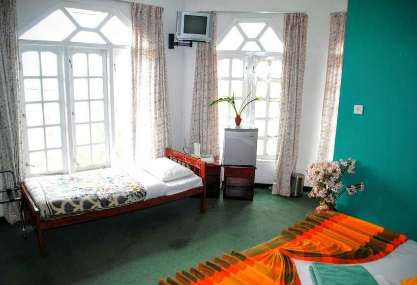 Habitació Triple Deluxe, Binota