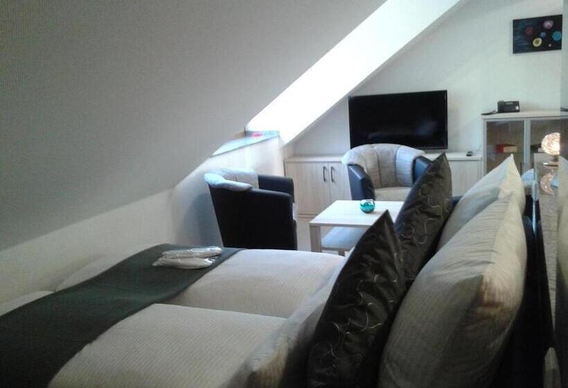 Quarto Quadruple Clássico, Dzt Schwarzwaldhotel Garni