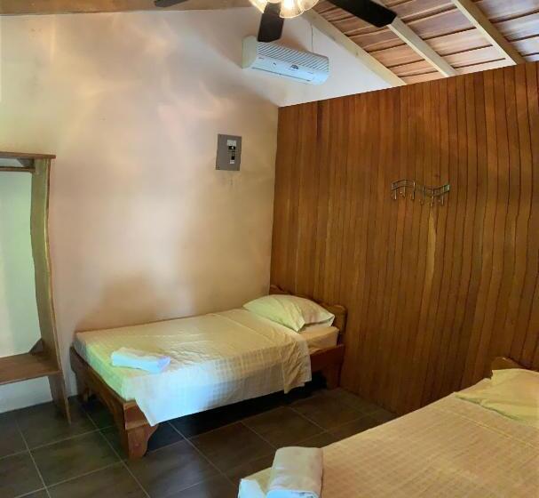 اتاق استاندارد چهارنفره با چشم‌انداز باغ, Laureles Collection Uvita   Cabinas Los Laureles