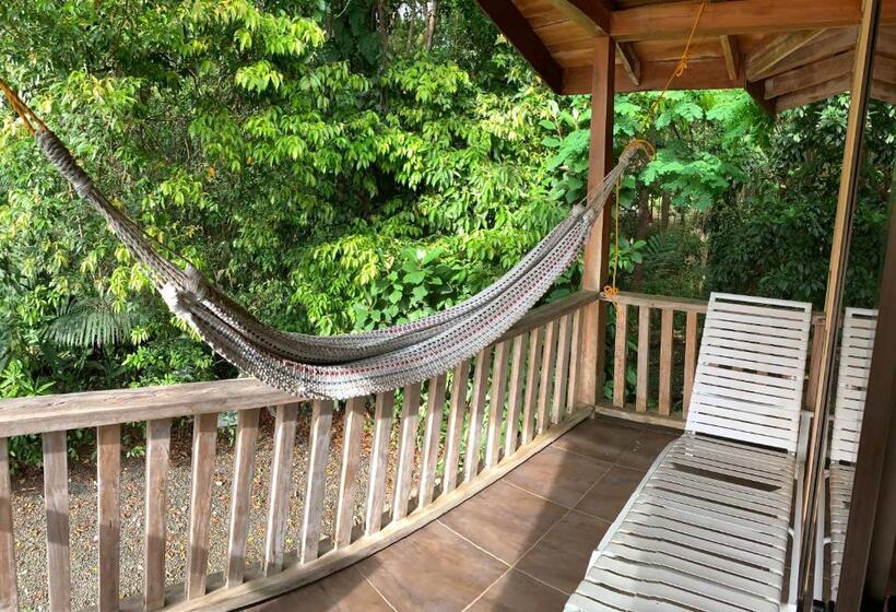 Quarto Quadruple Standart Vista Jardim, Laureles Collection Uvita   Cabinas Los Laureles
