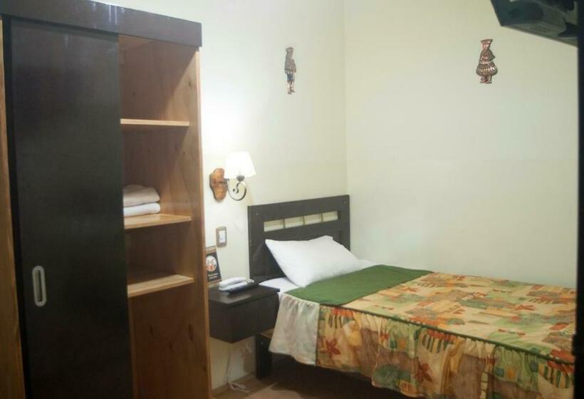 标准单人间, Tinkus Inn