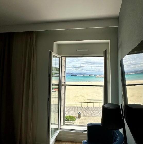 高级海景房, De La Baie