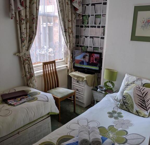 エコノミールーム, The New Guilderoy