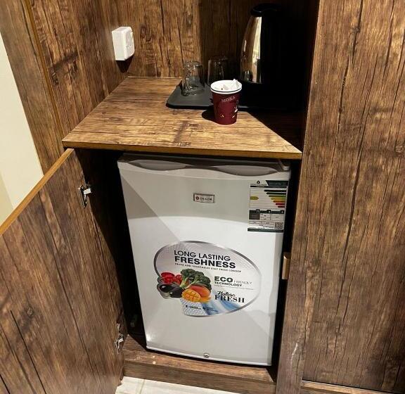 חדר סטנדרט לשלושה, فندق الخلفاء الماسي