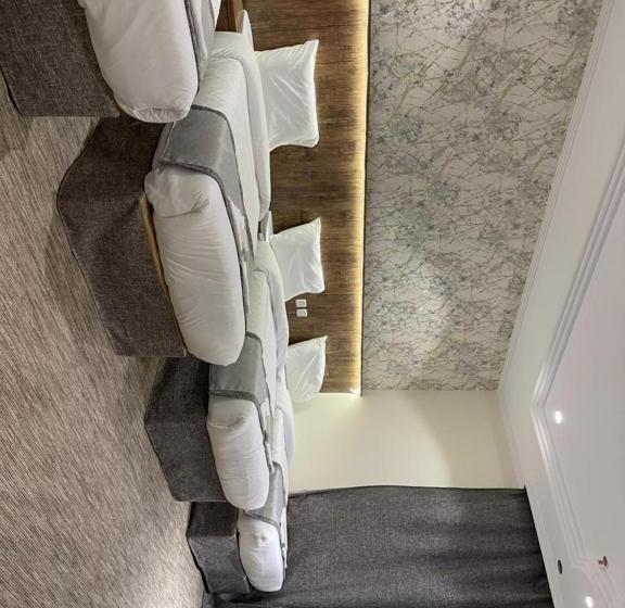 חדר סטנדרט לארבעה, فندق الخلفاء الماسي