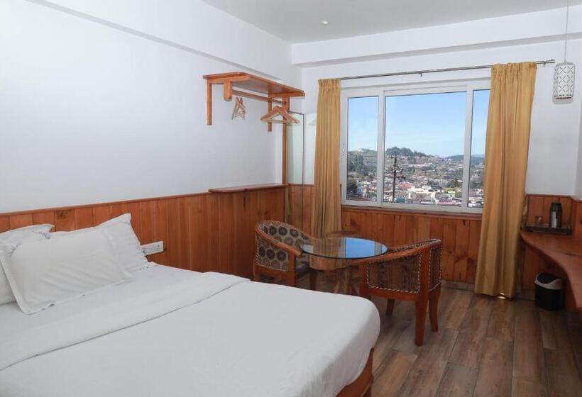 キングサイズベッドのスタンダードルーム, The Woodlands Residency  Unmarried And Stag Groups Not Allowed