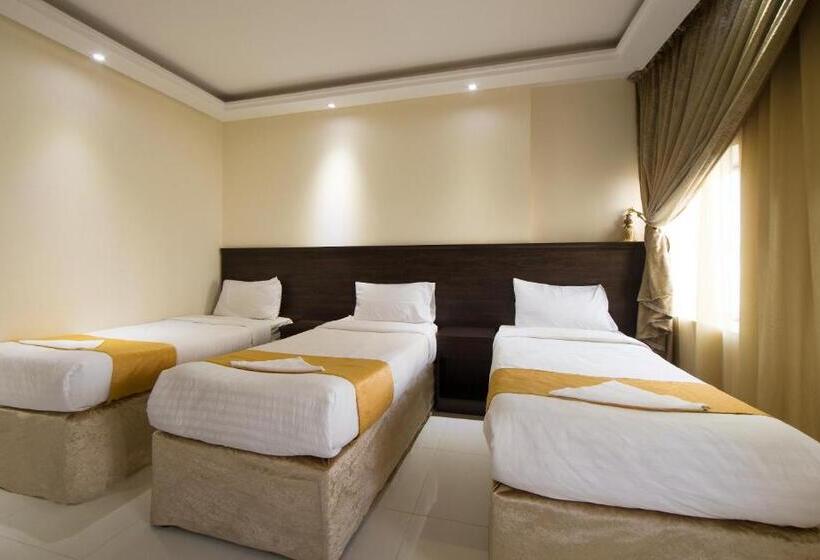 חדר אקונומי לשלושה, Snood Al Azama