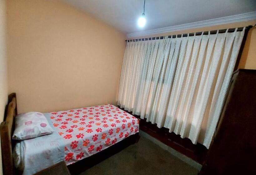 اتاق یک تخته با چشم‌انداز باغ, ñaupa House Hostel