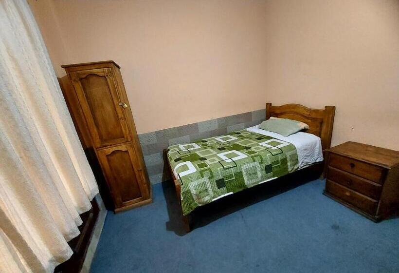 اتاق یک تخته با چشم‌انداز باغ, ñaupa House Hostel