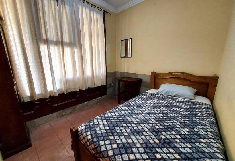 اتاق یک تخته با چشم‌انداز باغ, ñaupa House Hostel