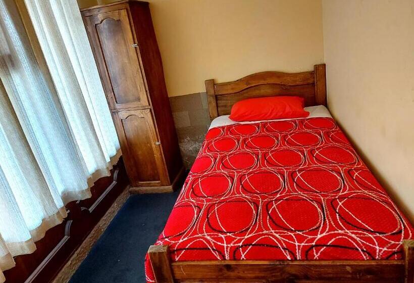 اتاق یک تخته با چشم‌انداز باغ, ñaupa House Hostel