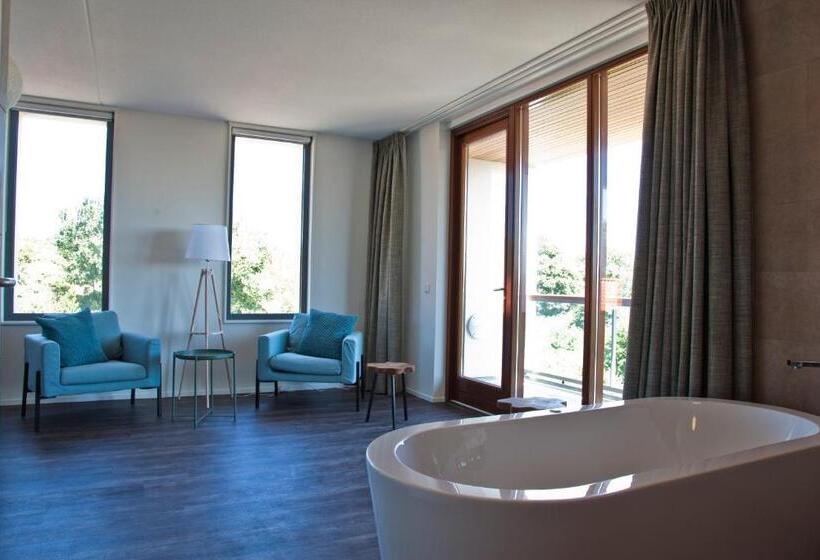 מיטת קינג בסוויטה, Strandhotel Duinoord