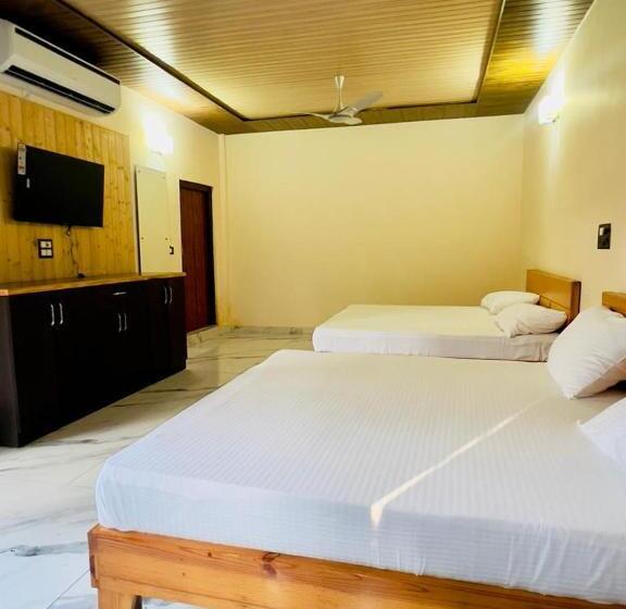 Chambre Quadruple Standard, The Greenwich Resort