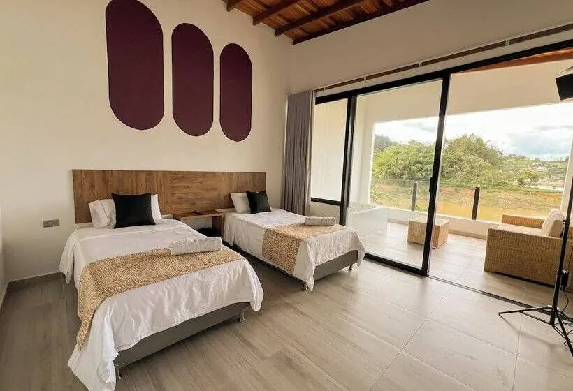 デラックストリプルルーム, Viajero Guatapé Hostel & Lake Club