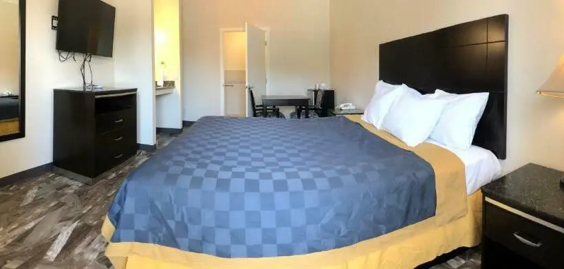 キングサイズベッドのデラックスルーム, Castaic Inn Near Six Flags Magic Mountain