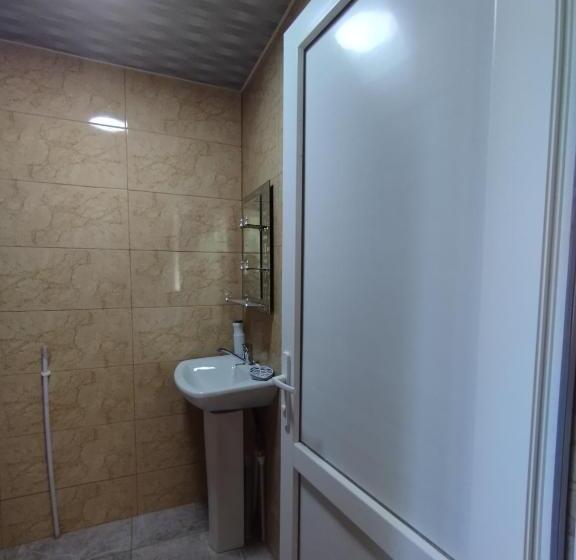 اتاق استاندارد سه تخته با چشمانداز باغ, Guest House Udziro