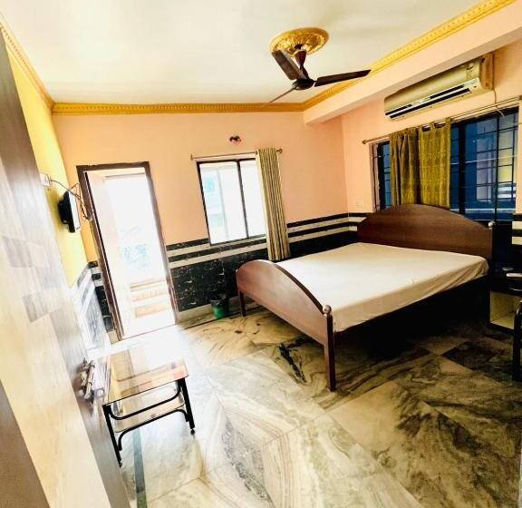 디럭스 트리플 룸, Goroomgo Relyef Inn Kolkata Fully Air Conditioned