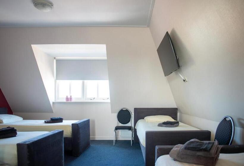 חדר דלוקס לארבעה, De Harmonie