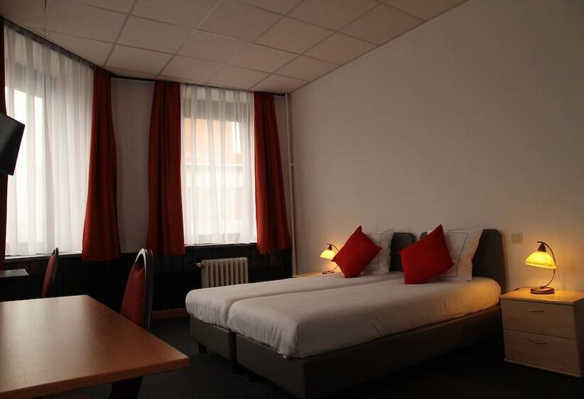 غرفة عائلية, De Spiegel