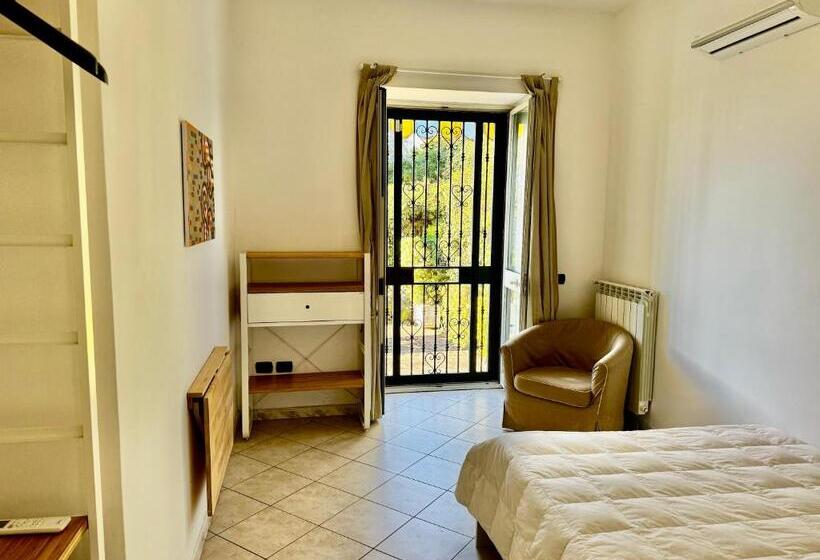 Апартаменты 1 Спальня с Террасой, B&b Dumbolo