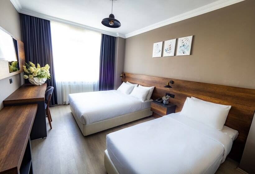 标准三人间, Londra Inn