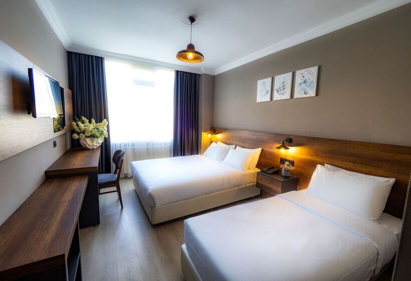 标准三人间, Londra Inn