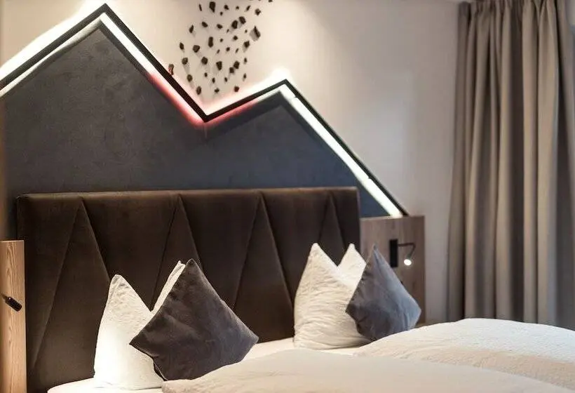 Deluxe-huone, Berghang