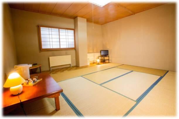 Quarto Economy Banheiro Compartilhado, Tae Windsor