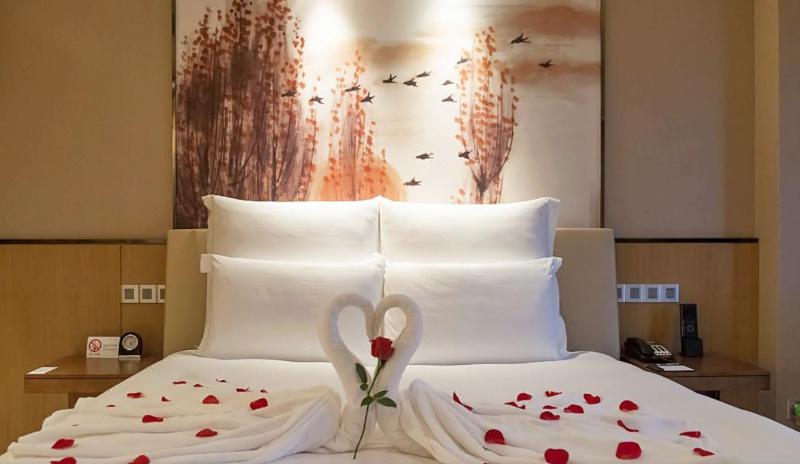 Номер Стандарт Вид на Сад, Four Seasons Hotel Kuala Lumpur